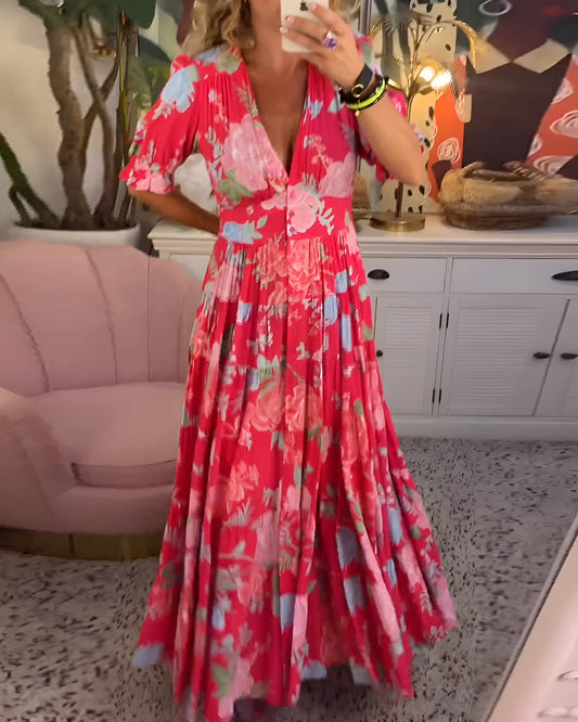 Carine | Klänning med fickor, V-ringning och blommigt tryck