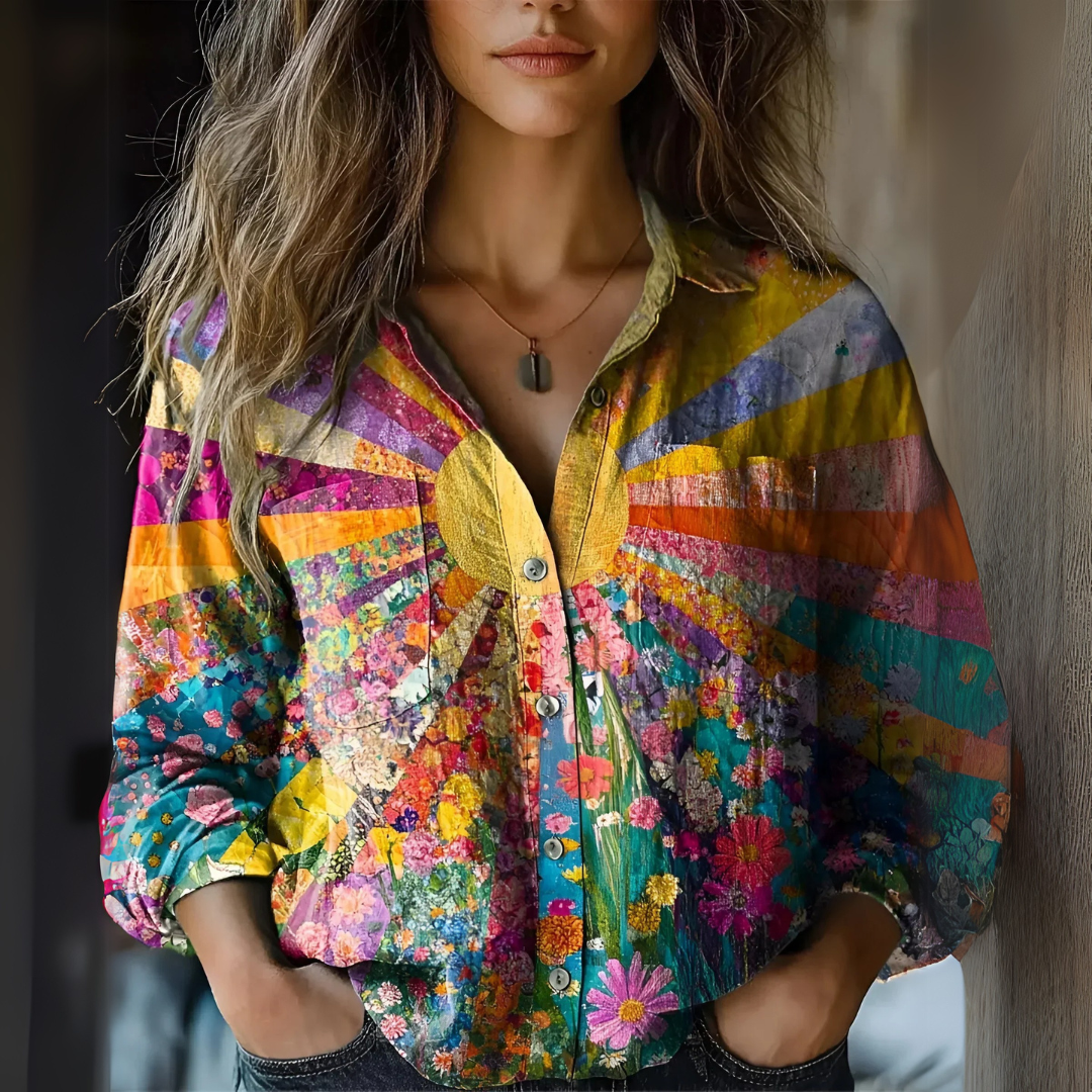 CHAR | BLUSE INSPIRERT AV SOLSIKKE